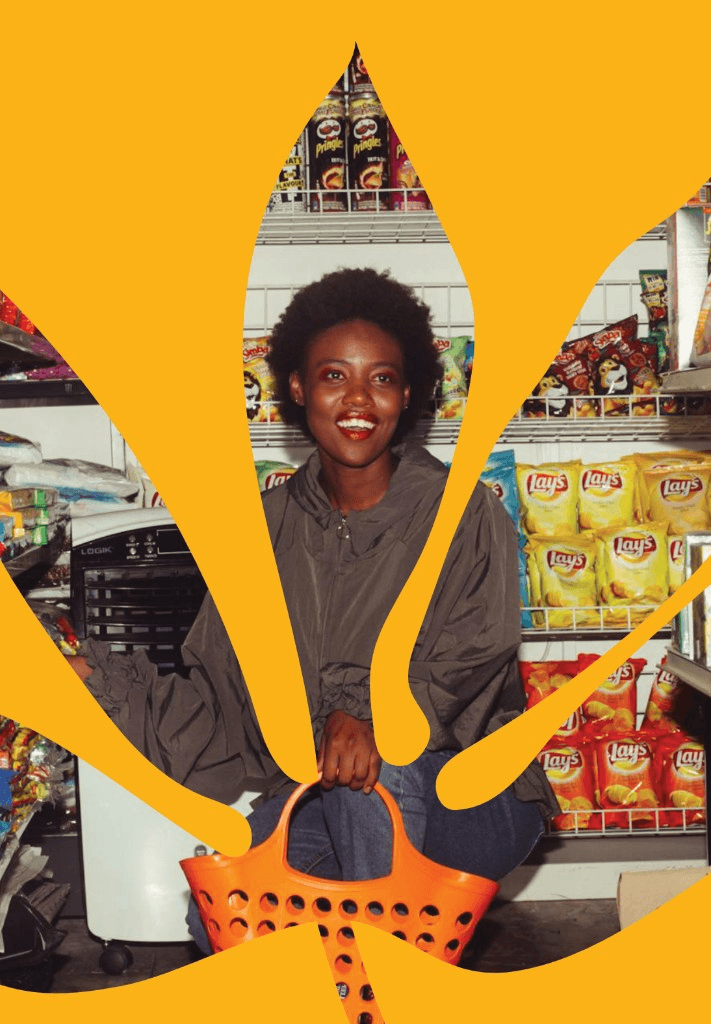 Mosolande brand photo of a shopper resting in a bright African supermarket aisle
