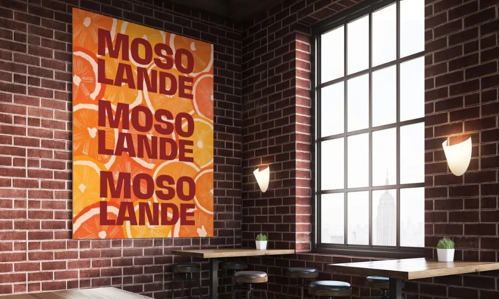 Mosolande poster on a brick cafe wall